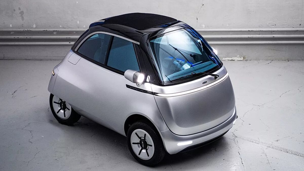 Qui sont les nouveaux constructeurs de voitures électriques ? voiture électrique microcar Microlino Crédit photo : Microlino Mondial de l'Auto 2022
